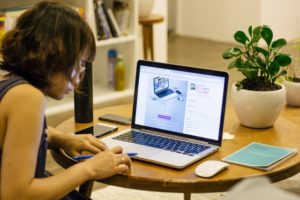 woman desk macbook pro pen 68761