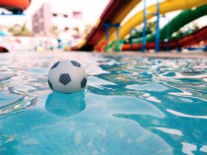 soccer ball on swimming pool 1361814