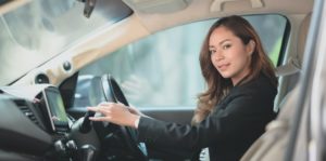 woman in black blazer driving a vehicle 3740591