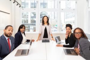 woman standing on the center table with four people on the 1367271